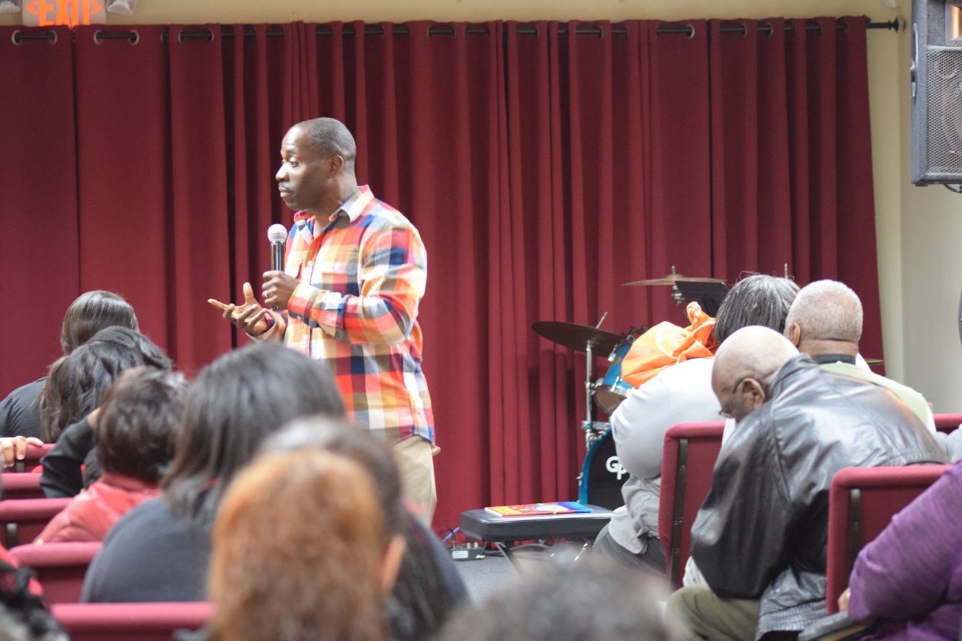 A PBF pastor preaching during Sunday worship