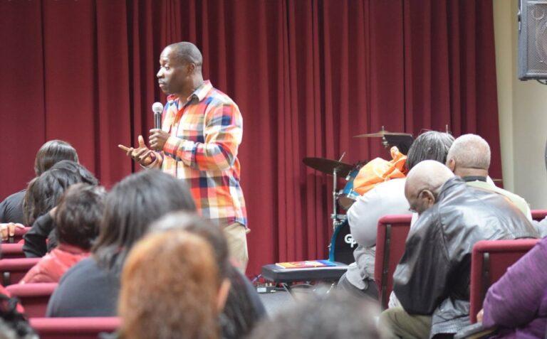 A PBF pastor preaching during Sunday worship